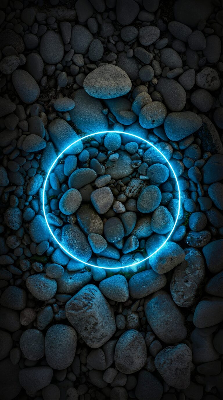 Glowing neon blue circle over dark smooth stones aesthetic AMOLED 4K ultra HD mobile wallpaper