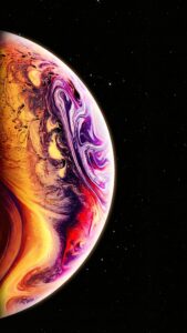 Close-up digital art of an abstract planet featuring swirling liquid textures in vibrant orange, gold, deep red, and purple colors, glowing against a stark black starry background, fluid marble aesthetic, 8K vertical mobile wallpaper.