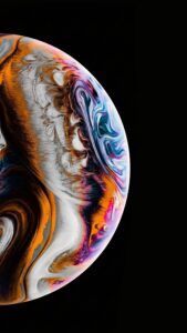 Vertical abstract art wallpaper featuring a half-planet sphere with swirling fluid textures in orange, white, and purple colors against a pitch-black background, 4K resolution macro wallpaper style, minimalist AMOLED background