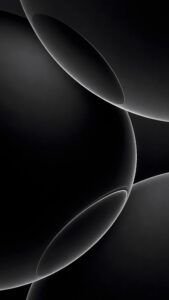 Vertical abstract digital art featuring large smooth dark spheres and flowing curves with glowing crisp white edges, ultra-minimalist monochrome aesthetic, true black AMOLED 4K wallpaper.