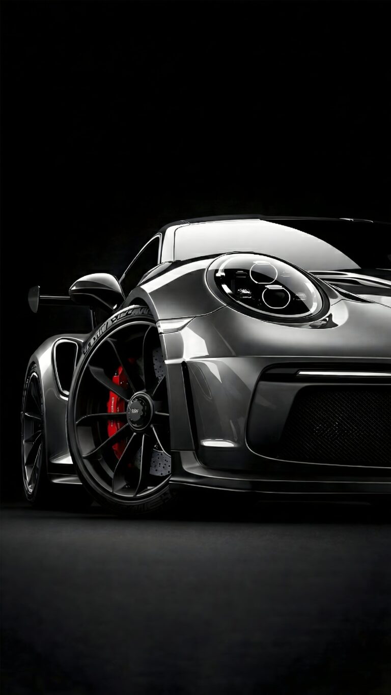 Highly detailed digital render of a sleek dark grey Porsche 911 GT3 RS supercar front close up in a pitch black minimalist studio aesthetic 4K ultra HD mobile wallpaper