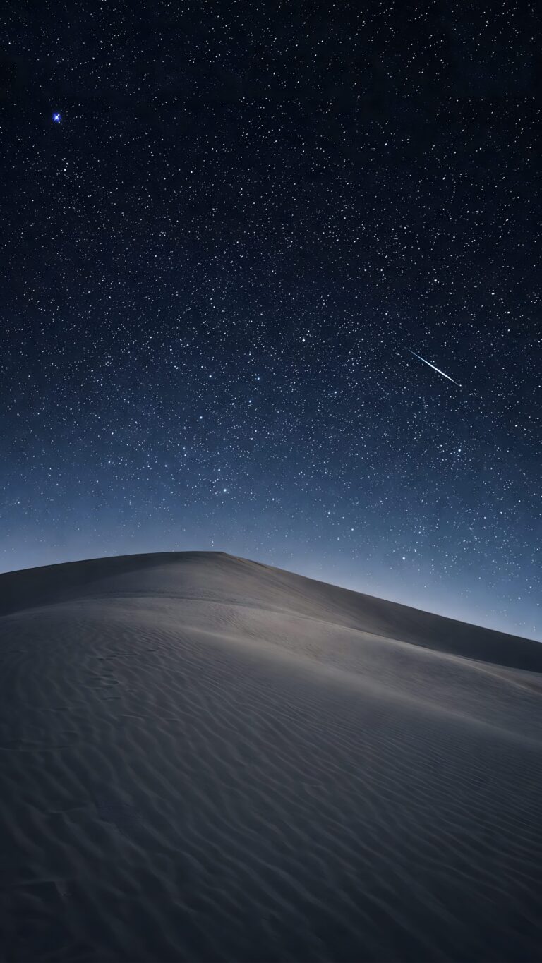Highly detailed digital render of a minimalist starry night sky over a dark desert sand dune with a glowing shooting star deep blue aesthetic 4K ultra HD mobile wallpaper