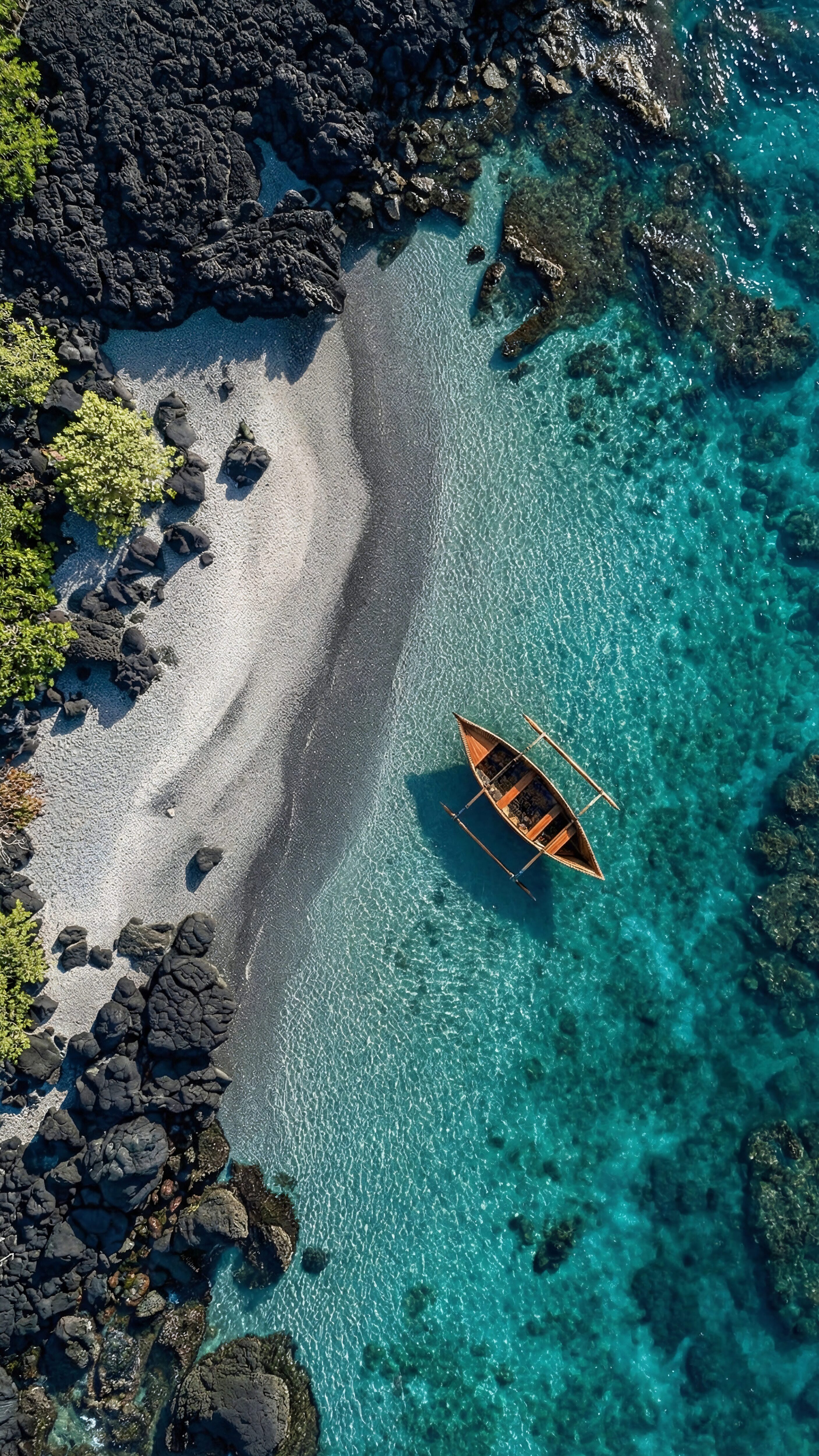 A high-resolution 4K aerial mobile wallpaper of a traditional wooden boat floating in crystal clear turquoise water next to a dark sandy and rocky coastline.