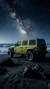 4K mobile wallpaper of a green Jeep Wrangler parked on a dark sandy beach at night under a stunning Milky Way galaxy sky.