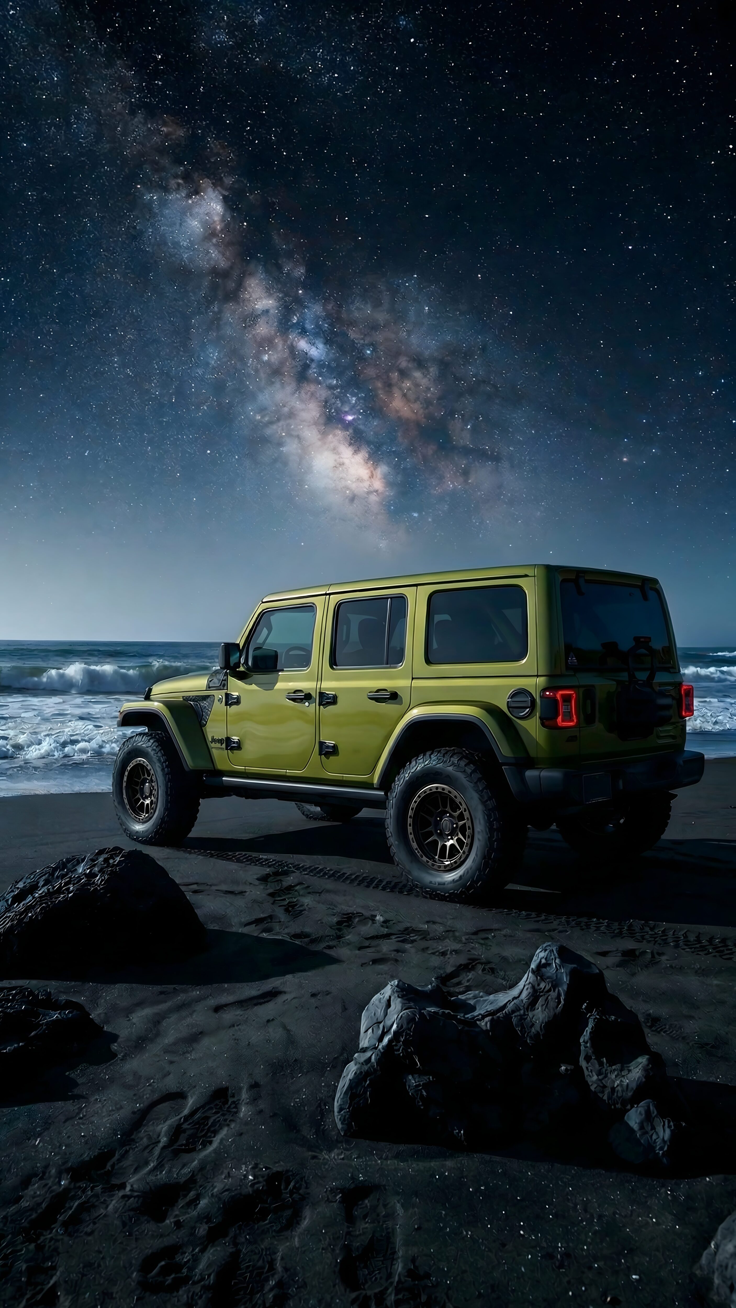 4K mobile wallpaper of a green Jeep Wrangler parked on a dark sandy beach at night under a stunning Milky Way galaxy sky.