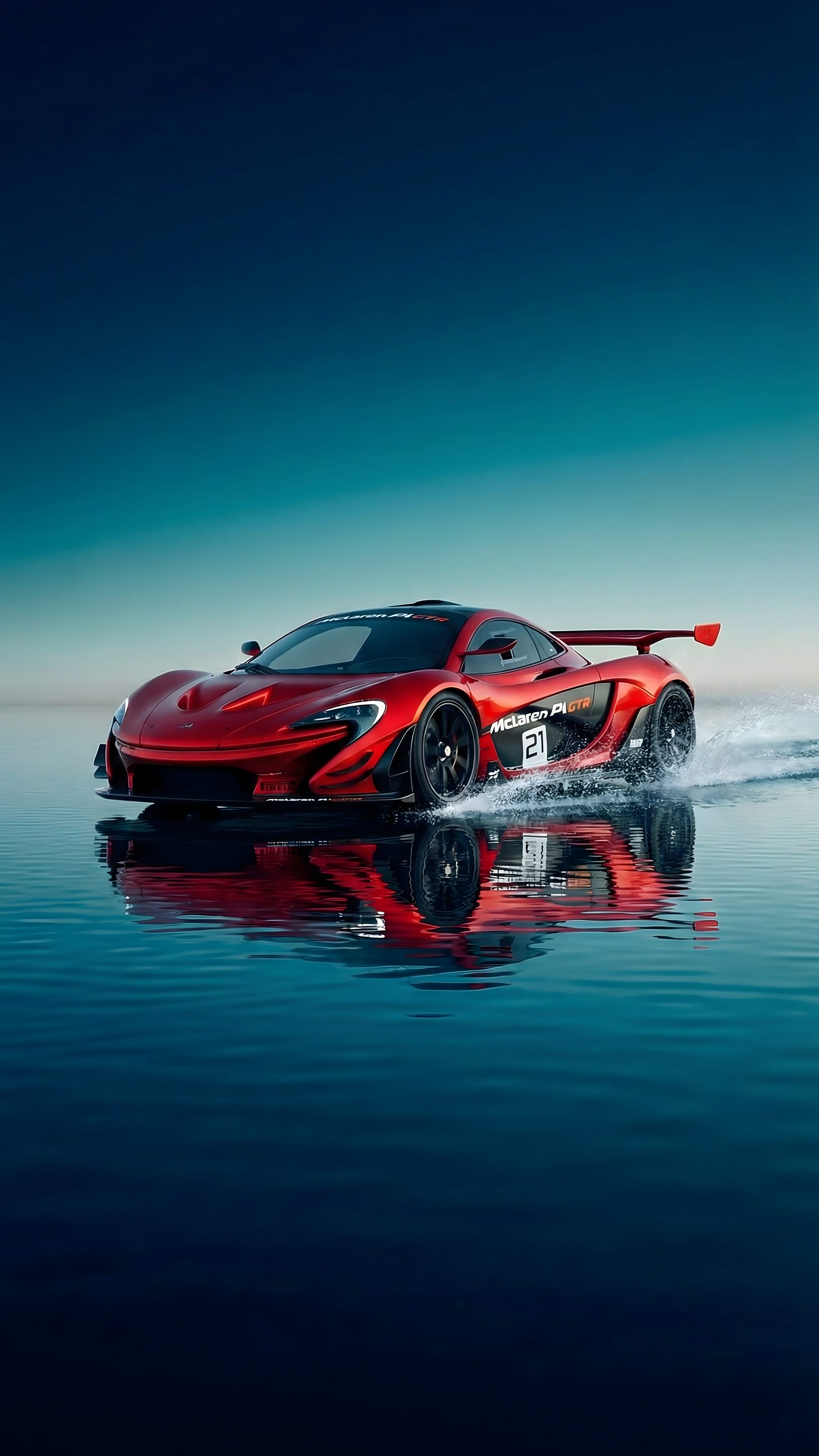 A 4K mobile wallpaper of a red McLaren P1 GTR supercar with the number 21 on the door, driving on a wet surface with a perfect reflection under a gradient blue sky.