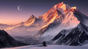Crystal clear 4K desktop wallpaper of snow-capped mountains glowing under a golden sunset with a twilight sky and moon.