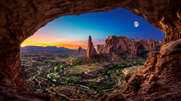 Best desktop wallpaper 4k featuring a desert canyon sunset, winding river, and glowing moon.