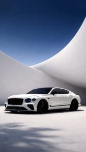 Sharp 4K mobile wallpaper of a sleek white luxury car parked in front of modern white architecture under a clear blue sky.