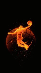 A glowing neon orange silhouette of a basketball player performing a slam dunk against a pitch-black background scattered with glowing embers.