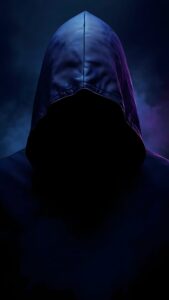 A mysterious figure wearing a dark hood with a completely shadowed face, illuminated by moody neon blue and purple smoke in the background.