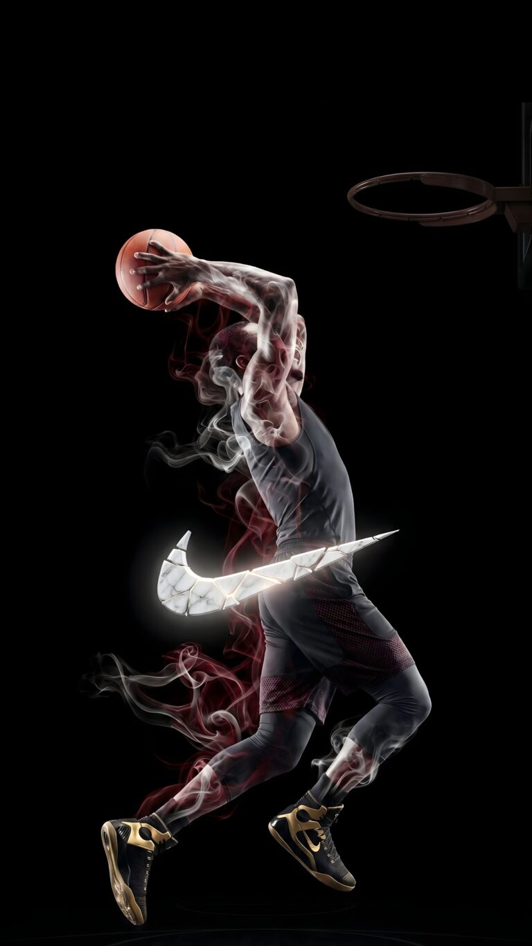 A basketball player dunking with his body transforming into smoke, featuring a shattered 3D Nike swoosh against a dark black background.