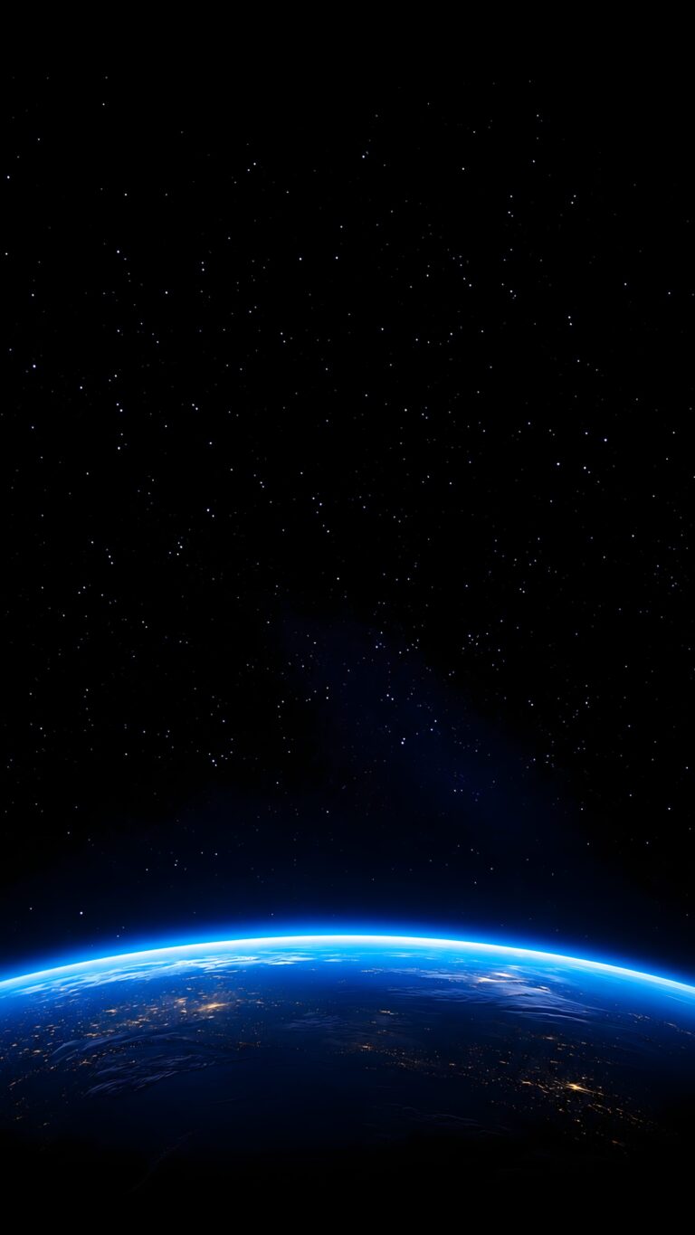 Earth from space at night showing glowing city lights and a vibrant blue atmosphere against a starry black sky for mobile wallpaper.