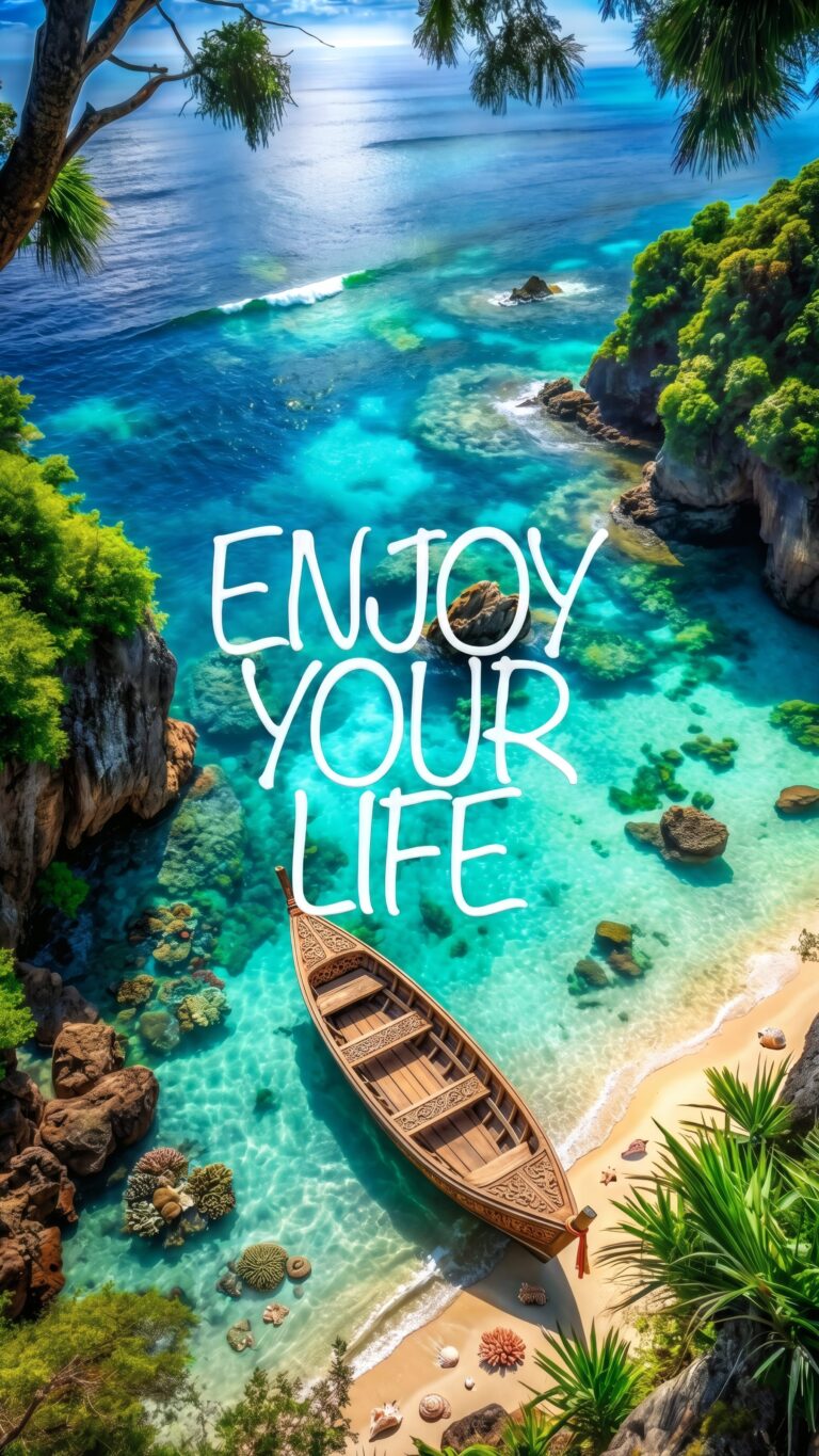 Vertical view of a tropical beach with crystal clear turquoise water, a wooden boat, lush cliffs, and the motivational text Enjoy Your Life.