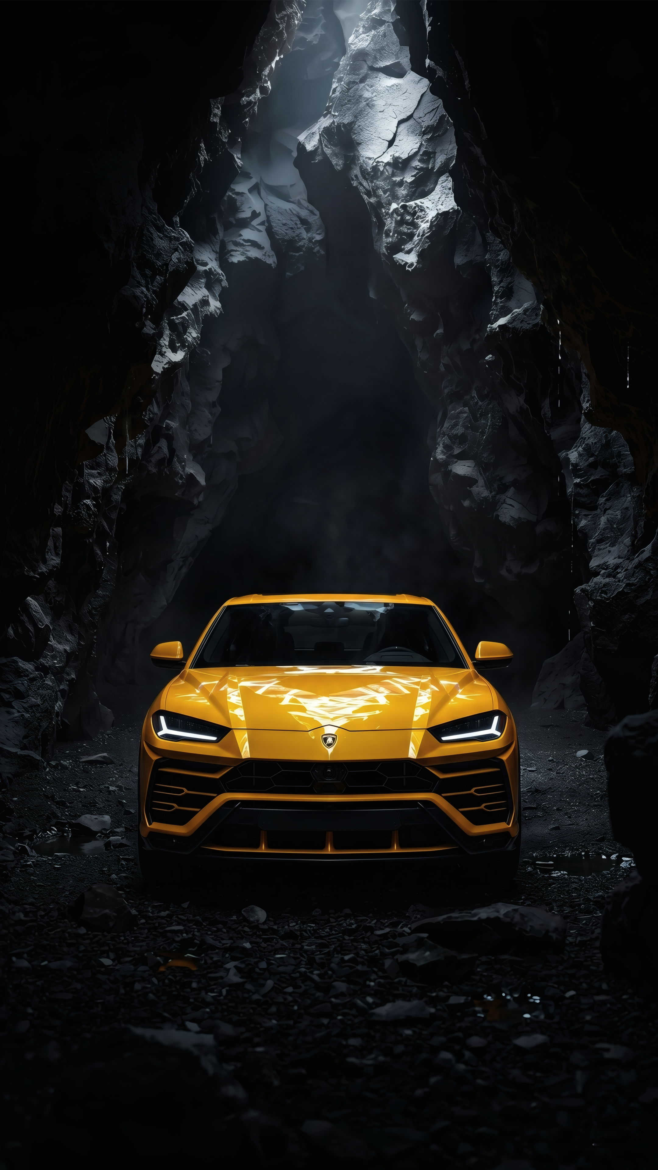 Bright yellow Lamborghini Urus parked inside a dark, rocky cave with dramatic overhead lighting.
