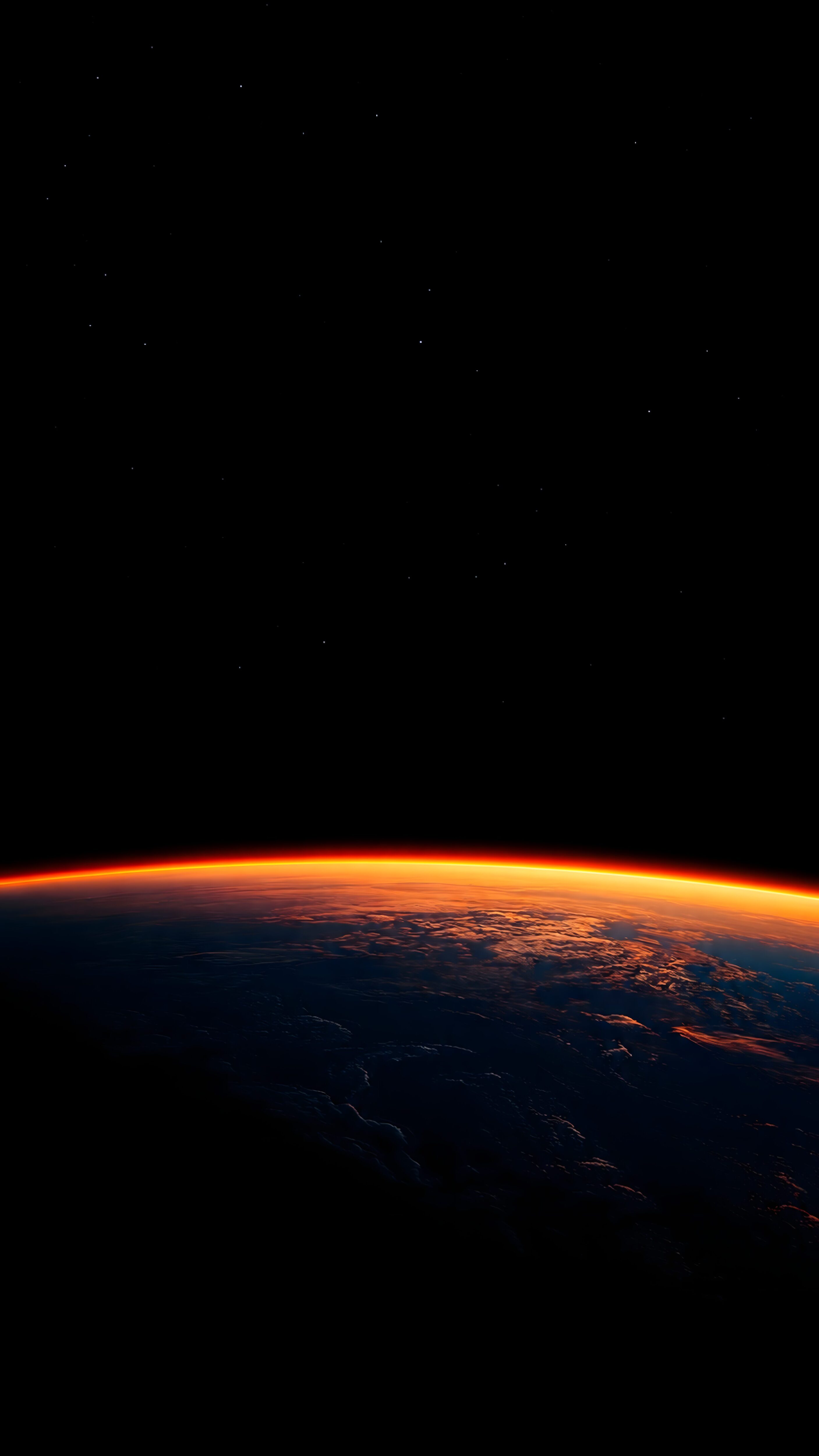 A breathtaking vertical view of Earth from space with a glowing orange atmospheric sunrise against a pitch-black starry sky.