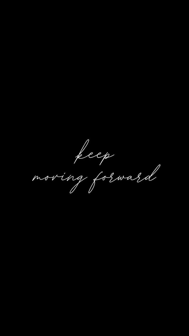 Minimalist black mobile wallpaper featuring the motivational quote keep moving forward in elegant white cursive handwriting.